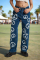 The Ragged Priest Peace Printed Dad Jeans as seen on Chloe Sims Size: 26" Colour: Blue